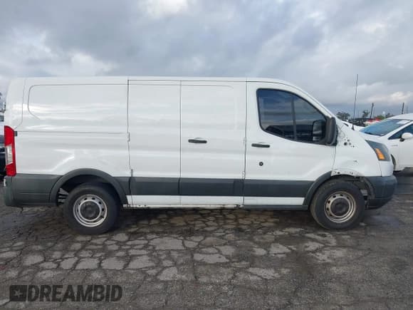 ✅ 2015 Ford Transit Cargo • VIN: 1FTNE1ZM8FKA86643 • Lot: 43684172. Listed on IAAI with 99,869 mi. Free auction sales archive from the USA and detailed vehicle history report at DreamBid. Image 12.