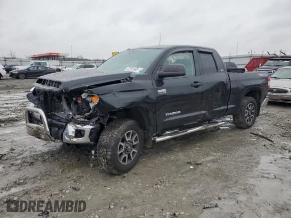 ✅ 2015 Toyota Tundra SR • VIN: 5TFUY5F18FX432679 • Lot: 84650254. Listed on Copart with 136,394 mi. Free auction sales archive from the USA and detailed vehicle history report at DreamBid. Image 1.