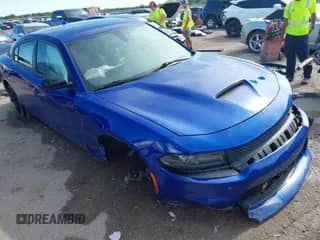 2018 Dodge Charger SXT Plus with VIN 2C3CDXHG8JH336010, listed as a IAAI auction lot 42899529 with 103,037 mi miles and . Bid and sale history available at DreamBid. Image 1.