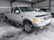 ✅ 2002 Ford F-150 XL • VIN: 1FTRX18LX2NA69730 • Lot: 43613087. Listed on IAAI with 190,123 mi. Free auction sales archive from the USA and detailed vehicle history report at DreamBid. Image 1.