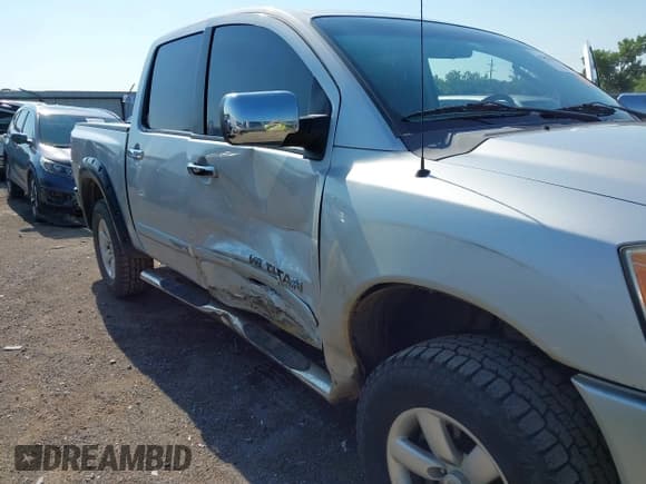 ✅ 2009 Nissan Titan LE • VIN: 1N6BA07C39N317709 • Lot: 42951891. Listed on IAAI with 199,571 mi. Free auction sales archive from the USA and detailed vehicle history report at DreamBid. Image 6.