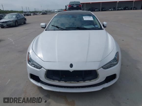✅ 2015 Maserati Ghibli • VIN: ZAM57XSA5F1148854 • Lot: 40626909. Listed on IAAI with 79,164 mi. Free auction sales archive from the USA and detailed vehicle history report at DreamBid. Image 12.