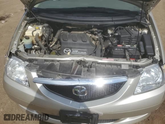 ✅ 2002 Mazda MPV LX • VIN: JM3LW28J620303427 • Лот: 59295635. Опубликован ранее на Copart с пробегом 112 001 миль. Бесплатный доступ к архиву аукционных продаж из США и подробный отчёт об истории автомобиля на DreamBid. Изображение 12.