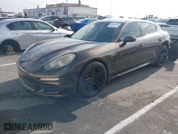 ✅ 2014 Porsche Panamera S • VIN: WP0AB2A75EL056107 • Lot: 42619685. Wystawiony na IAAI z przebiegiem 143 574 mil. Bezpłatny archiwum sprzedaży aukcyjnych z USA i szczegółowy raport historii pojazdu na DreamBid. Zdjęcie 2.