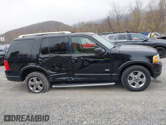 ✅ 2003 Ford Explorer Limited • VIN: 1FMDU75W23UC01032 • Lot: 41922485. Wystawiony na IAAI z przebiegiem 318 766 mil. Bezpłatny archiwum sprzedaży aukcyjnych z USA i szczegółowy raport historii pojazdu na DreamBid. Zdjęcie 13.