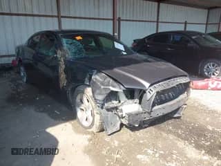 2013 Dodge Charger SE z VIN 2C3CDXBGXDH636354, wystawiony jako IAAI lot #43373664 z przebiegiem 166 848 mil mil oraz . Historia ofert i sprzedaży dostępna na DreamBid. Obrazek 1.