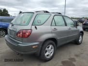 ✅ 2000 Lexus RX 300 • VIN: JT6HF10U2Y0115339 • Lot: 87243065. Listed on Copart with 184,457 mi. Free auction sales archive from the USA and detailed vehicle history report at DreamBid. Image 3.