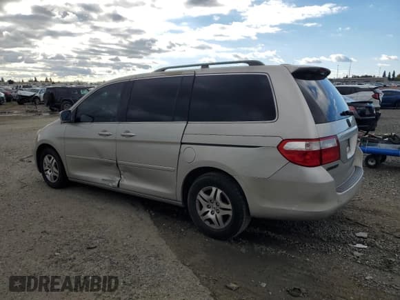 ✅ 2006 Honda Odyssey EX-L • VIN: 5FNRL387X6B039464 • Лот: 93323725. Опубликован ранее на Copart с пробегом 180 680 миль. Бесплатный доступ к архиву аукционных продаж из США и подробный отчёт об истории автомобиля на DreamBid. Изображение 2.