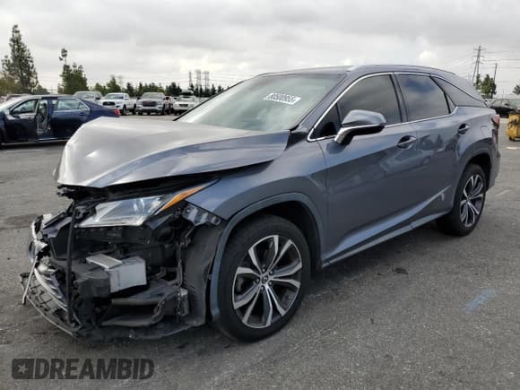 ✅ 2018 Lexus RX 350L Premium • VIN: JTJGZKCA0J2007666 • Lot: 80500955. Listed on Copart with 86,377 mi. Free auction sales archive from the USA and detailed vehicle history report at DreamBid. Image 1.