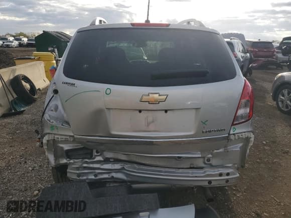 ✅ 2014 Chevrolet Captiva Sport LS • VIN: 3GNAL2EK0ES585445 • Lot: 82624875. Wystawiony na Copart z przebiegiem 52 955 mil. Bezpłatny archiwum sprzedaży aukcyjnych z USA i szczegółowy raport historii pojazdu na DreamBid. Zdjęcie 6.