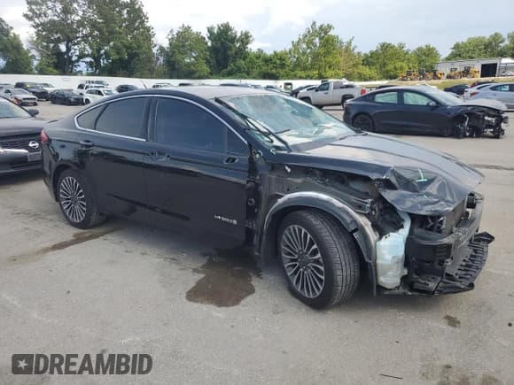 ✅ 2018 Ford Fusion Titanium • VIN: 3FA6P0RU2JR226253 • Lot: 68665825. Wystawiony na Copart z przebiegiem 99 190 mil. Bezpłatny archiwum sprzedaży aukcyjnych z USA i szczegółowy raport historii pojazdu na DreamBid. Zdjęcie 4.