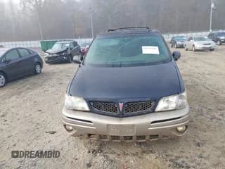 ✅ 2002 Pontiac Montana w/1SE Pkg • VIN: 1GMDX13E22D236747 • Lot: 43742565. Wystawiony na IAAI z przebiegiem 240 674 mil. Bezpłatny archiwum sprzedaży aukcyjnych z USA i szczegółowy raport historii pojazdu na DreamBid. Zdjęcie 6.