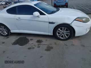 ✅ 2007 Hyundai Tiburon GS • VIN: KMHHM66D47U254751 • Лот: 43124714. Опубликован ранее на IAAI с пробегом 206 292 миль. Бесплатный доступ к архиву аукционных продаж из США и подробный отчёт об истории автомобиля на DreamBid. Изображение 6.