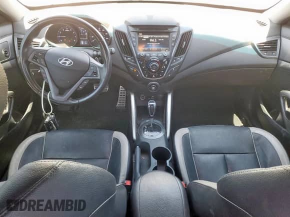 2015 Hyundai Veloster Turbo R-Spec z VIN KMHTC6AE5FU237176, wystawiony jako Copart lot #60752925 z przebiegiem 80 702 mil mil oraz Szkoda całkowita • Salvage title. Historia ofert i sprzedaży dostępna na DreamBid. Obrazek 8.