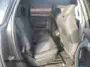 2014 Chevrolet Traverse LT z VIN 1GNKRGKD2EJ106126, wystawiony jako Copart lot #82273195 z przebiegiem 234 917 mil mil oraz Szkoda całkowita • Salvage title. Historia ofert i sprzedaży dostępna na DreamBid. Obrazek 11.