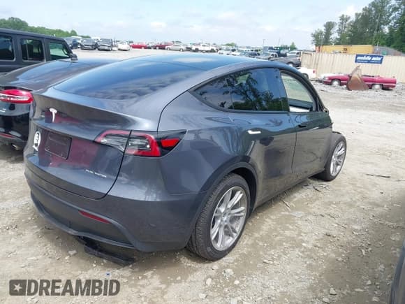✅ 2023 Tesla Model Y Long Range • VIN: 7SAYGDEE1PA166355 • Lot: 42162227. Listed on IAAI with 11,040 mi. Free auction sales archive from the USA and detailed vehicle history report at DreamBid. Image 4.