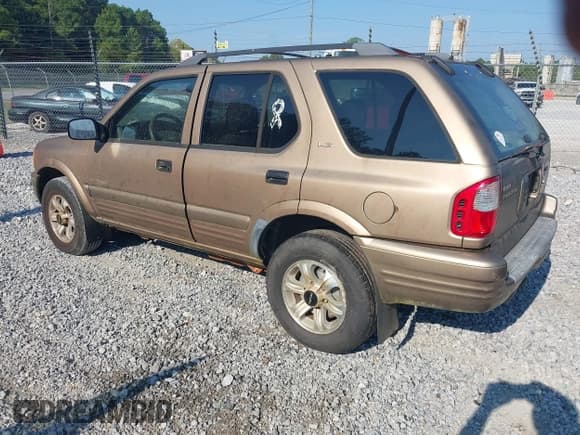 ✅ 2001 Isuzu Rodeo S • VIN: 4S2CK58W714300131 • Lot: 42993854. Wystawiony na IAAI z przebiegiem 332 181 mil. Bezpłatny archiwum sprzedaży aukcyjnych z USA i szczegółowy raport historii pojazdu na DreamBid. Zdjęcie 3.