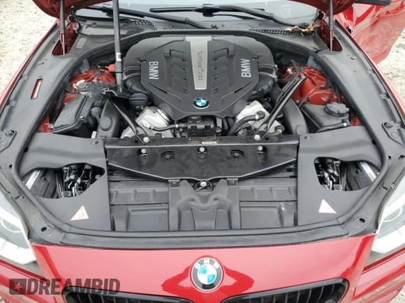 ✅ 2012 BMW 6 Series 650i • VIN: WBALX3C50CDV77414 • Лот: 91379005. Опубликован ранее на Copart с пробегом 40 534 миль. Бесплатный доступ к архиву аукционных продаж из США и подробный отчёт об истории автомобиля на DreamBid. Изображение 11.