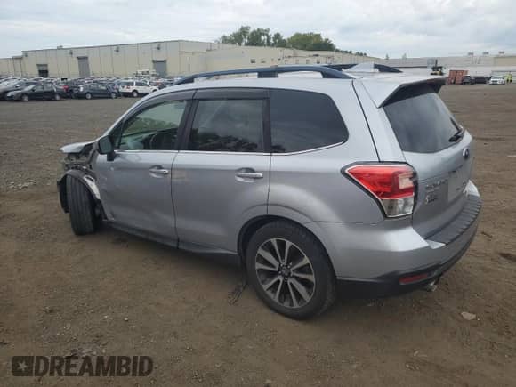 2017 Subaru Forester Premium with VIN JF2SJGECXHH537197, listed as a Copart auction lot 70521415 with 105,322 mi miles and Salvage title. Bid and sale history available at DreamBid. Image 2.