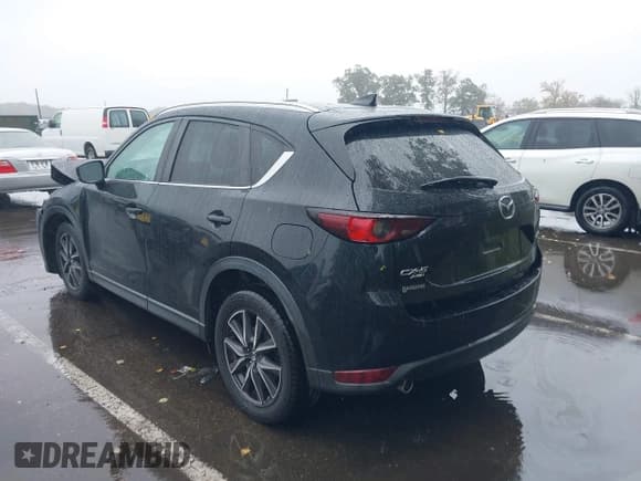 ✅ 2018 Mazda CX-5 Touring • VIN: JM3KFBCM3J0437436 • Lot: 43436406. Wystawiony na IAAI z przebiegiem 122 774 mil. Bezpłatny archiwum sprzedaży aukcyjnych z USA i szczegółowy raport historii pojazdu na DreamBid. Zdjęcie 3.