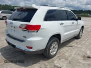 ✅ 2015 Jeep Grand Cherokee • VIN: 1C4RJEJM8FC674648 • Lot: 42785823. Listed on IAAI with 207,084 mi. Free auction sales archive from the USA and detailed vehicle history report at DreamBid. Image 4.