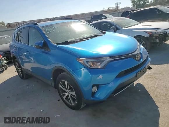 ✅ 2018 Toyota RAV4 XLE • VIN: 2T3WFREV0JW412501 • Lot: 86102895. Listed on Copart with 92,051 mi. Free auction sales archive from the USA and detailed vehicle history report at DreamBid. Image 14.
