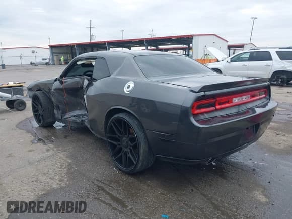 ✅ 2013 Dodge Challenger Rallye Redline • VIN: 2C3CDYAG0DH704233 • Lot: 41299191. Wystawiony na IAAI z przebiegiem 158 081 mil. Bezpłatny archiwum sprzedaży aukcyjnych z USA i szczegółowy raport historii pojazdu na DreamBid. Zdjęcie 3.