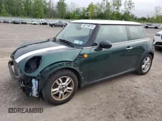 2012 MINI Hardtop with VIN WMWSU3C51CT259005, listed as a Copart auction lot 60710015 with 84,218 mi miles and Salvage title. Bid and sale history available at DreamBid. Image 1.