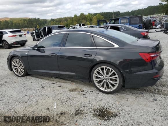 ✅ 2019 Audi A6 Prestige • VIN: WAUM2AF28KN038718 • Лот: 85381635. Опубликован ранее на Copart с пробегом 104 020 миль. Бесплатный доступ к архиву аукционных продаж из США и подробный отчёт об истории автомобиля на DreamBid. Изображение 2.