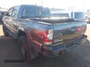 ✅ 2014 Toyota Tacoma PreRunner • VIN: 5TFJX4GN1EX031474 • Lot: 43596592. Listed on IAAI with 77,249 mi. Free auction sales archive from the USA and detailed vehicle history report at DreamBid. Image 3.