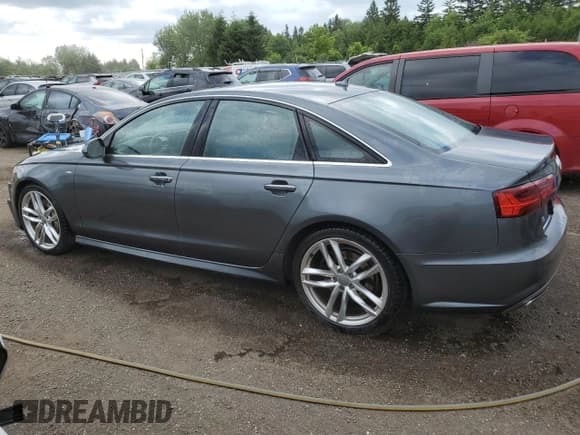 ✅ 2018 Audi A6 • VIN: WAUJ3AFC0JN034248 • Lot: 61051335. Listed on Copart with 126,267 mi. Free auction sales archive from the USA and detailed vehicle history report at DreamBid. Image 2.