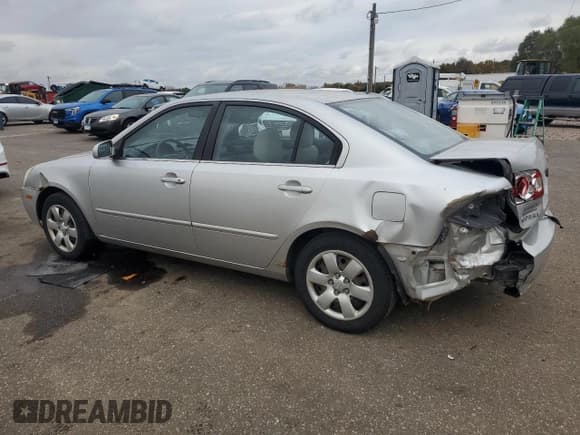 ✅ 2007 Kia Optima LX • VIN: KNAGE123375135870 • Лот: 90048305. Опубликован ранее на Copart с пробегом 213 245 миль. Бесплатный доступ к архиву аукционных продаж из США и подробный отчёт об истории автомобиля на DreamBid. Изображение 2.