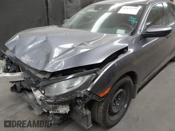 ✅ 2020 Honda Civic LX • VIN: 19XFC2F67LE006057 • Lot: 42032759. Listed on IAAI with 119,319 mi. Free auction sales archive from the USA and detailed vehicle history report at DreamBid. Image 6.