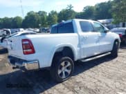 ✅ 2021 Ram 1500 Laramie • VIN: 1C6RREJT4MN630316 • Lot: 42844637. Listed on IAAI with 116,198 mi. Free auction sales archive from the USA and detailed vehicle history report at DreamBid. Image 4.