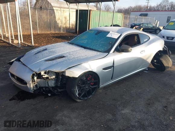 ✅ 2014 Jaguar XK XKR • VIN: SAJWA4DC7EMB52199 • Lot: 41191119. Listed on IAAI with 90,585 mi. Free auction sales archive from the USA and detailed vehicle history report at DreamBid. Image 2.