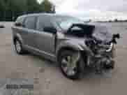 2012 Dodge Journey American Value z VIN 3C4PDCAB4CT146025, wystawiony jako Copart lot #81183785 z przebiegiem 166 921 mil mil oraz Szkoda całkowita • Salvage title. Historia ofert i sprzedaży dostępna na DreamBid. Obrazek 4.