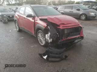 2020 Hyundai Kona SEL z VIN KM8K22AA1LU509951, wystawiony jako Copart lot #61039692 z przebiegiem 26 704 mil mil oraz . Historia ofert i sprzedaży dostępna na DreamBid. Obrazek 1.