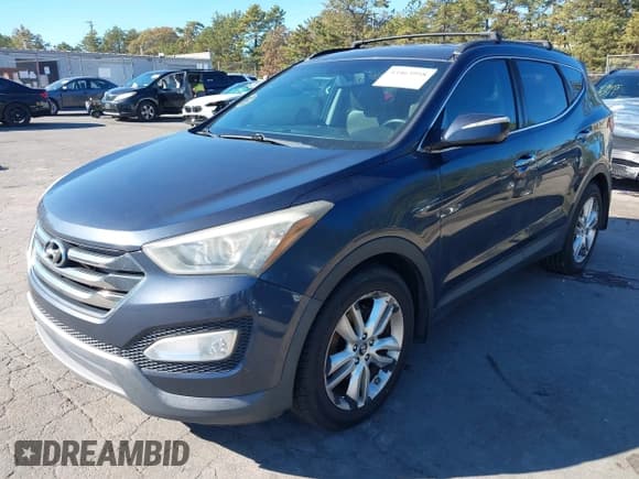 ✅ 2013 Hyundai Santa Fe Sport • VIN: 5XYZU3LA4DG099729 • Lot: 43463958. Listed on IAAI with 164,931 mi. Free auction sales archive from the USA and detailed vehicle history report at DreamBid. Image 2.