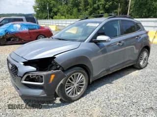 ✅ 2020 Hyundai Kona SEL • VIN: KM8K2CAA7LU473852 • Лот: 62653353. Опубликован ранее на Copart с пробегом 24 411 миль. Бесплатный доступ к архиву аукционных продаж из США и подробный отчёт об истории автомобиля на DreamBid. Изображение 1.