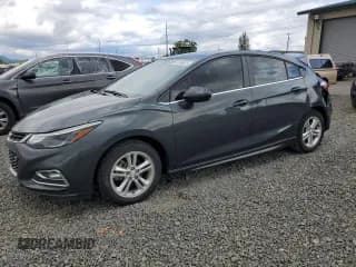 ✅ 2018 Chevrolet Cruze LT • VIN: 3G1BE6SM2JS600325 • Lot: 61686515. Listed on Copart with 148,097 mi. Free auction sales archive from the USA and detailed vehicle history report at DreamBid. Image 1.
