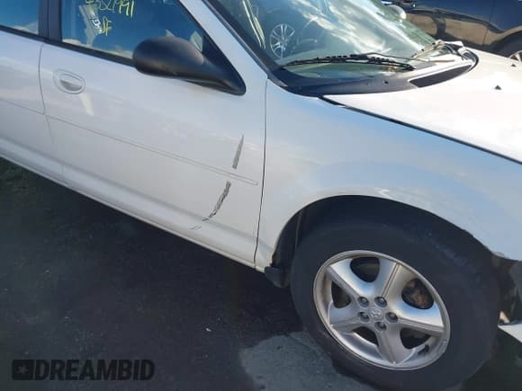 ✅ 2006 Dodge Stratus SXT • VIN: 1B3EL46R16N223249 • Lot: 43521991. Listed on IAAI with 170,379 mi. Free auction sales archive from the USA and detailed vehicle history report at DreamBid. Image 18.