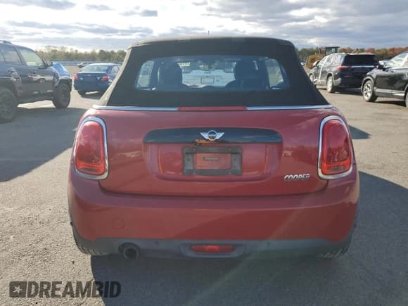 ✅ 2017 MINI Convertible Cooper • VIN: WMWWG5C35H3C98970 • Лот: 91039495. Опубликован ранее на Copart с пробегом 75 190 миль. Бесплатный доступ к архиву аукционных продаж из США и подробный отчёт об истории автомобиля на DreamBid. Изображение 6.