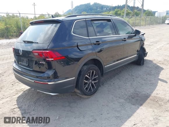 ✅ 2021 Volkswagen Tiguan SE • VIN: 3VV2B7AX6MM031264 • Лот: 43224608. Опубликован ранее на IAAI с пробегом 61 896 миль. Бесплатный доступ к архиву аукционных продаж из США и подробный отчёт об истории автомобиля на DreamBid. Изображение 4.