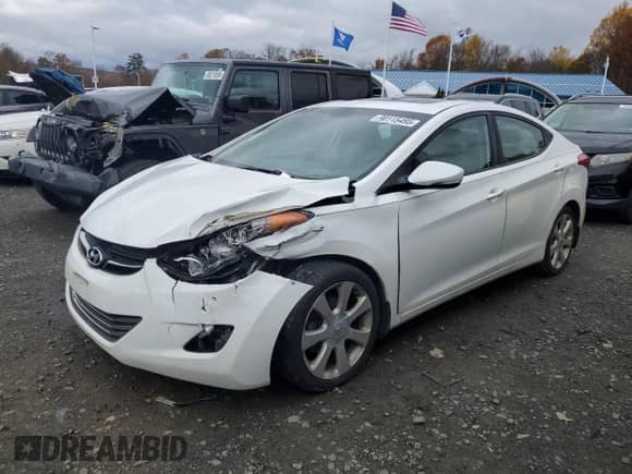 2013 Hyundai Elantra GLS with VIN 5NPDH4AE1DH256314, listed as a Copart auction lot 90115495 with 115,073 mi miles and Salvage title. Bid and sale history available at DreamBid. Image 1.