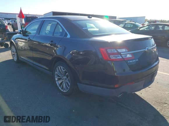 ✅ 2014 Ford Taurus Limited • VIN: 1FAHP2F88EG112833 • Lot: 43890442. Listed on IAAI with 151,894 mi. Free auction sales archive from the USA and detailed vehicle history report at DreamBid. Image 3.