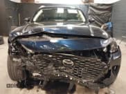 ✅ 2024 Mazda CX-90 Select • VIN: JM3KKAHD4R1182557 • Лот: 40770956. Опубликован ранее на IAAI с пробегом 4 111 миль. Бесплатный доступ к архиву аукционных продаж из США и подробный отчёт об истории автомобиля на DreamBid. Изображение 12.