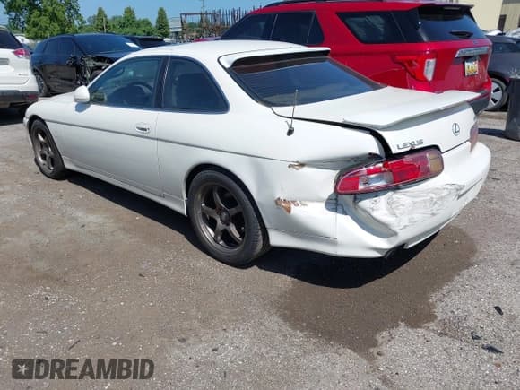✅ 1997 Lexus SC 300 • VIN: JT8CD32Z2V0039032 • Lot: 42556454. Listed on IAAI with 164,629 mi. Free auction sales archive from the USA and detailed vehicle history report at DreamBid. Image 3.