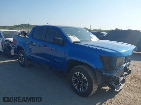 ✅ 2022 Chevrolet Colorado 4WD Z71 • VIN: 1GCGTDEN8N1304213 • Лот: 42937775. Опубликован ранее на IAAI с пробегом 26 868 миль. Бесплатный доступ к архиву аукционных продаж из США и подробный отчёт об истории автомобиля на DreamBid. Изображение 1.