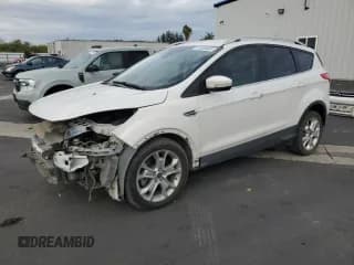 ✅ 2015 Ford Escape Titanium • VIN: 1FMCU0J91FUB72131 • Lot: 91034065. Listed on Copart with 150,247 mi. Free auction sales archive from the USA and detailed vehicle history report at DreamBid. Image 1.