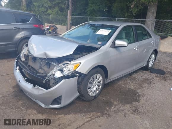 ✅ 2013 Toyota Camry LE • VIN: 4T4BF1FK1DR305982 • Lot: 43079253. Listed on IAAI with 92,098 mi. Free auction sales archive from the USA and detailed vehicle history report at DreamBid. Image 2.